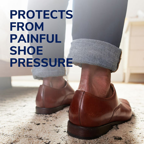 Hydrogel blister cushion on heel under a sock inside a shoe