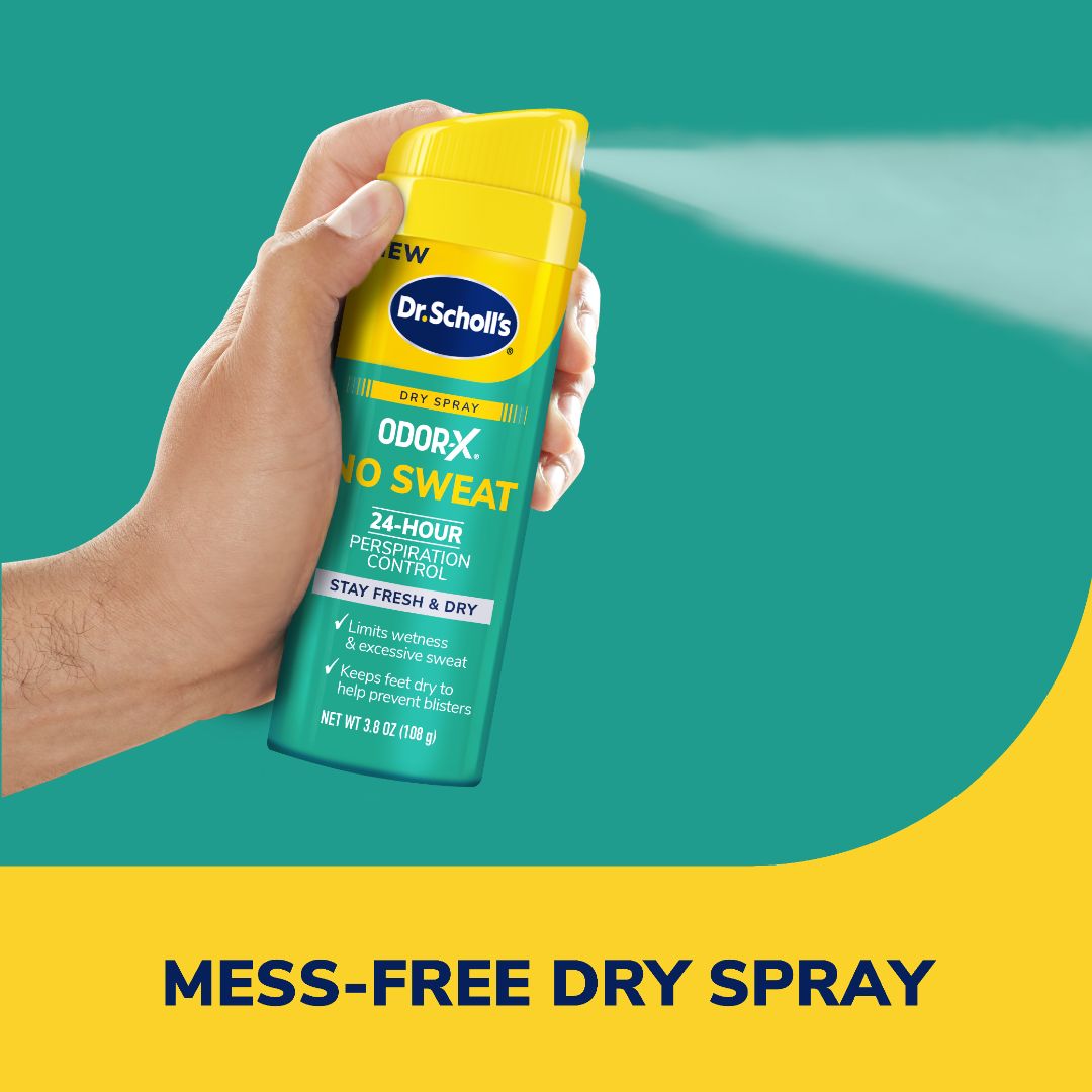 Odor-X® No Sweat dry spray bottle held in hand