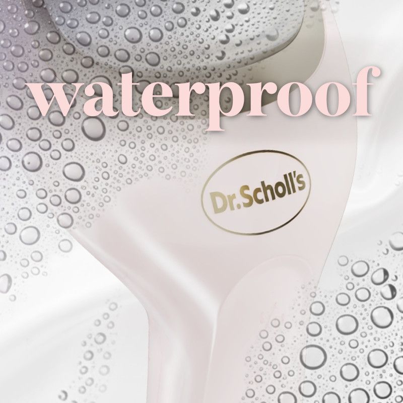 White waterproof electronic foot file with water droplets on the device body